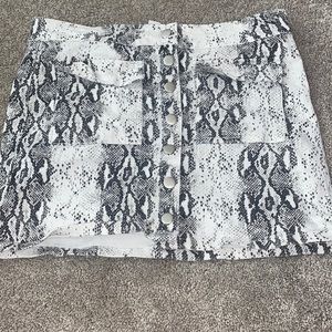 West Of Mel rose snake skin skirt